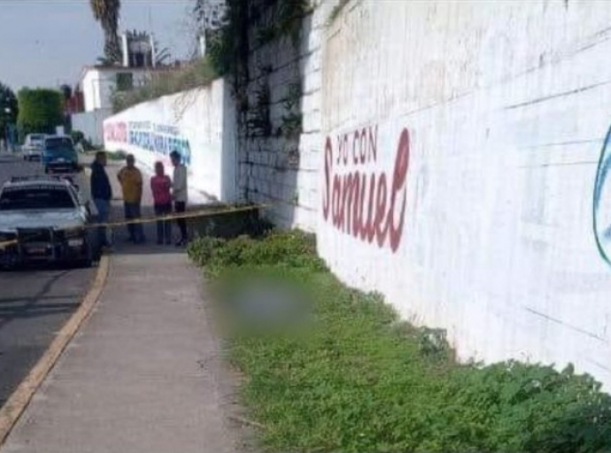 Asesinan a balazos a mujer 