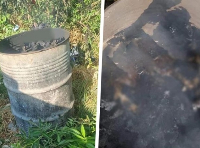 Hallan cadáver calcinado dentro de tambo